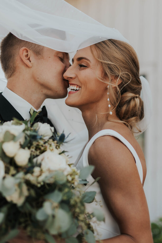 romantic bride and groom portraits at Riverview Barn, Sioux Falls