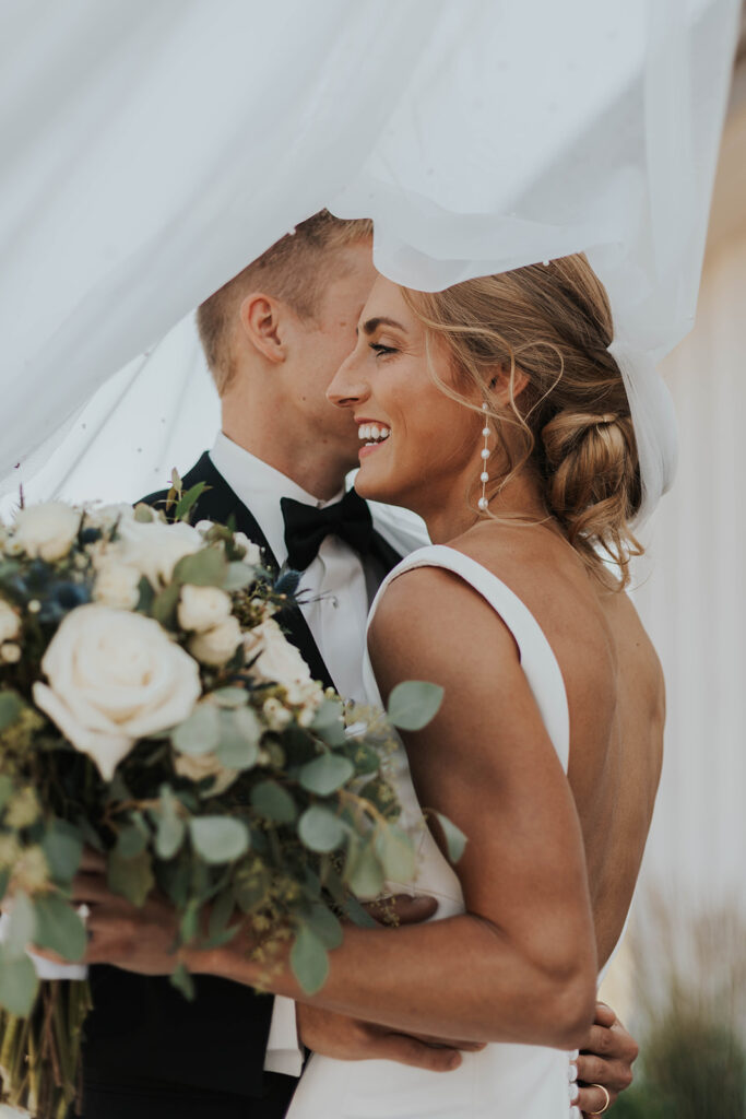 romantic bride and groom portraits at Riverview Barn, Sioux Falls