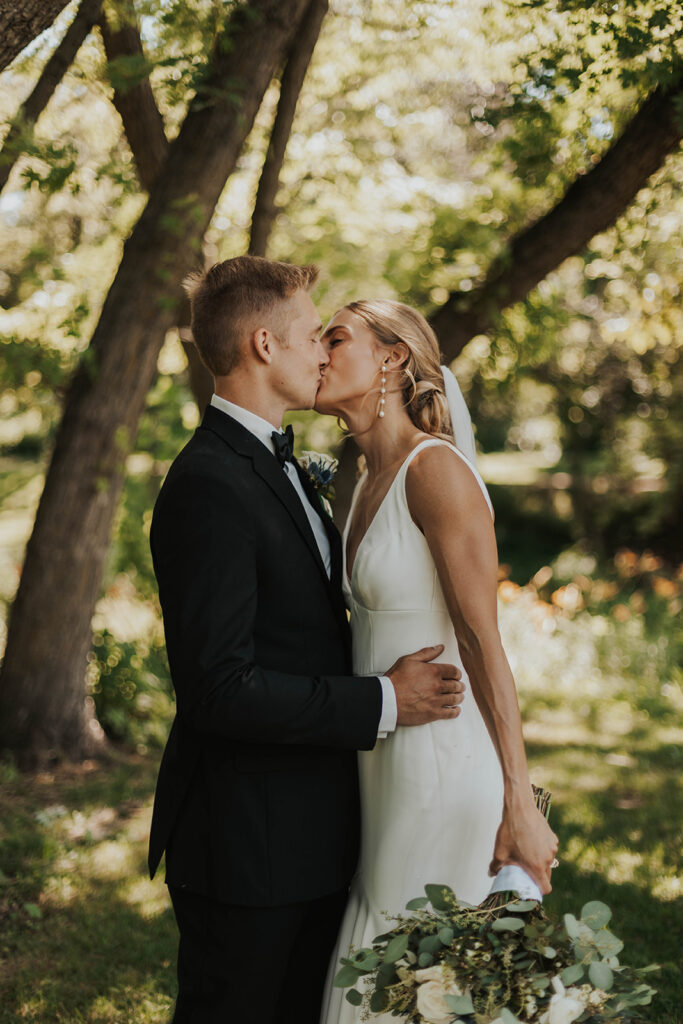 romantic bride and groom portraits at Riverview Barn, Sioux Falls