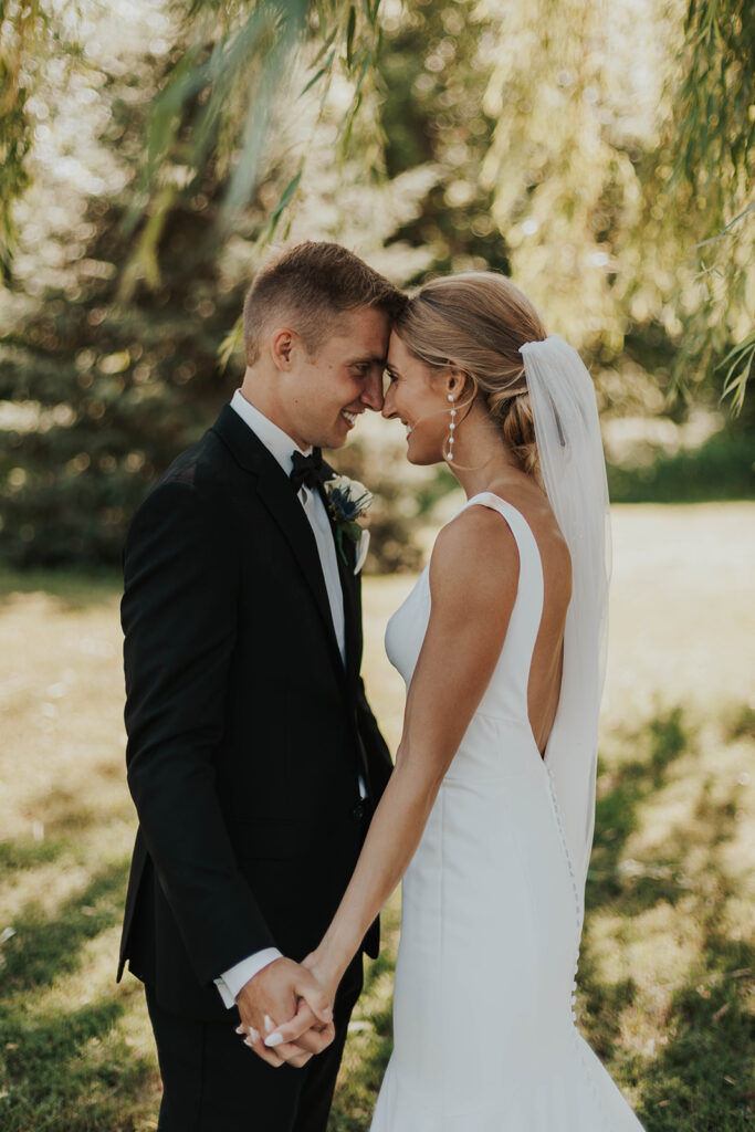 romantic bride and groom portraits at Riverview Barn, Sioux Falls