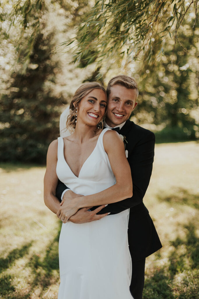 romantic bride and groom portraits at Riverview Barn, Sioux Falls