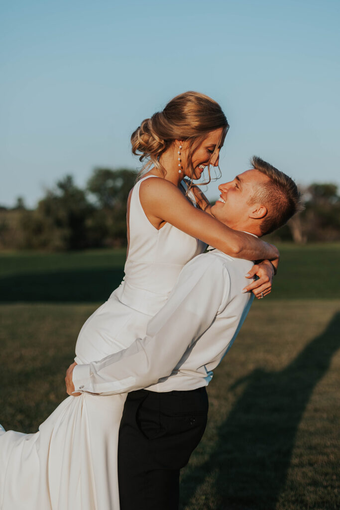 romantic bride and groom portraits at Riverview Barn, Sioux Falls