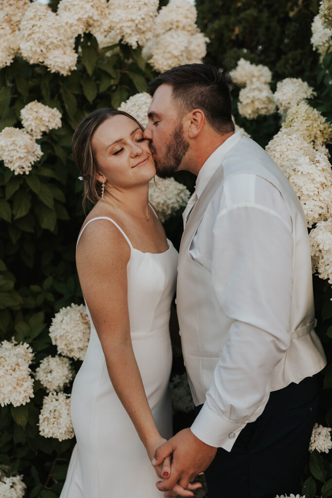 candid and romantic bride and groom portrait outdoors at prairie winds event center