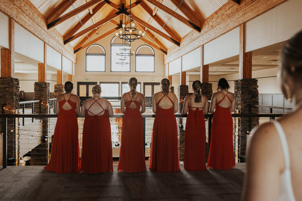 bride and bridesmaids first look