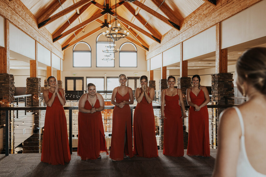 bride and bridesmaids first look