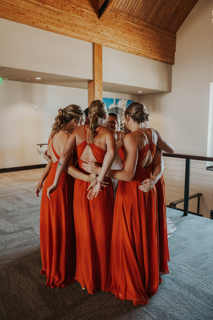 bride and bridesmaids first look