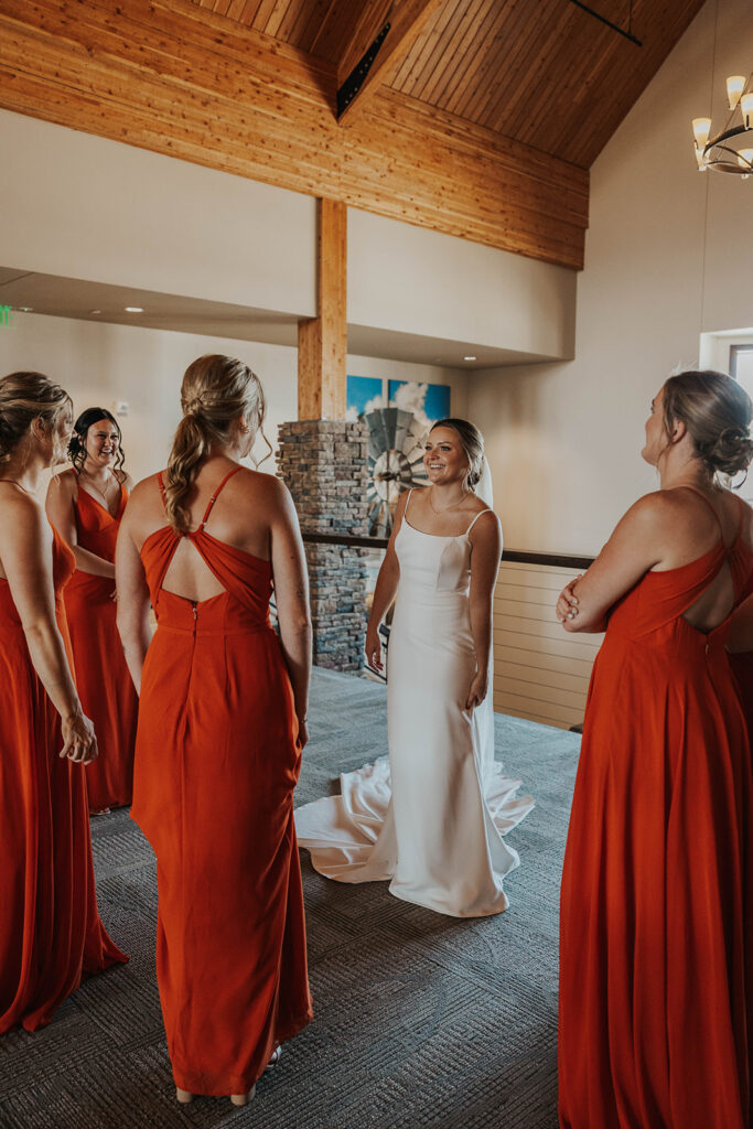 bride and bridesmaids first look