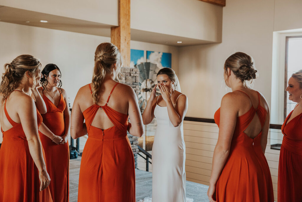 bride and bridesmaids first look