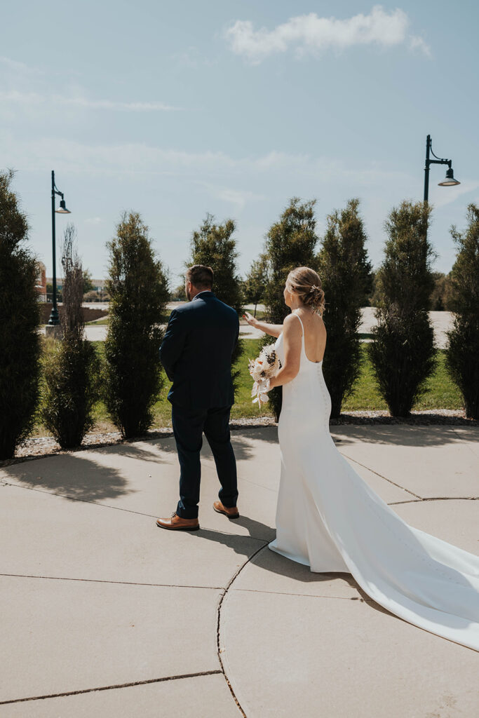 bride and groom emotional first look