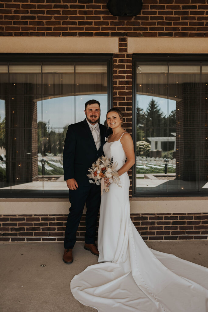 candid and romantic bride and groom portrait outdoors at prairie winds event center