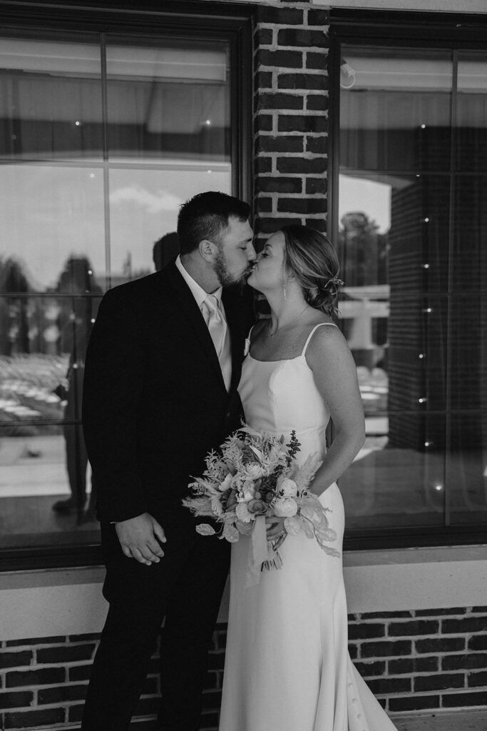 candid and romantic bride and groom portrait outdoors