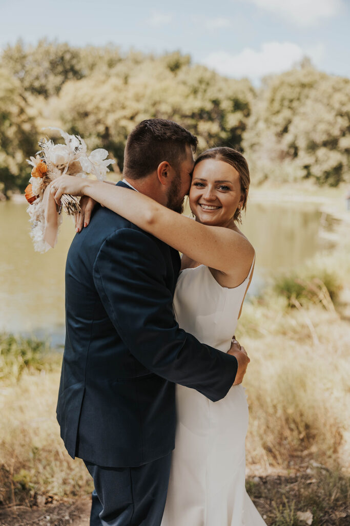 romantic bride and groom portrait at prairie winds event center