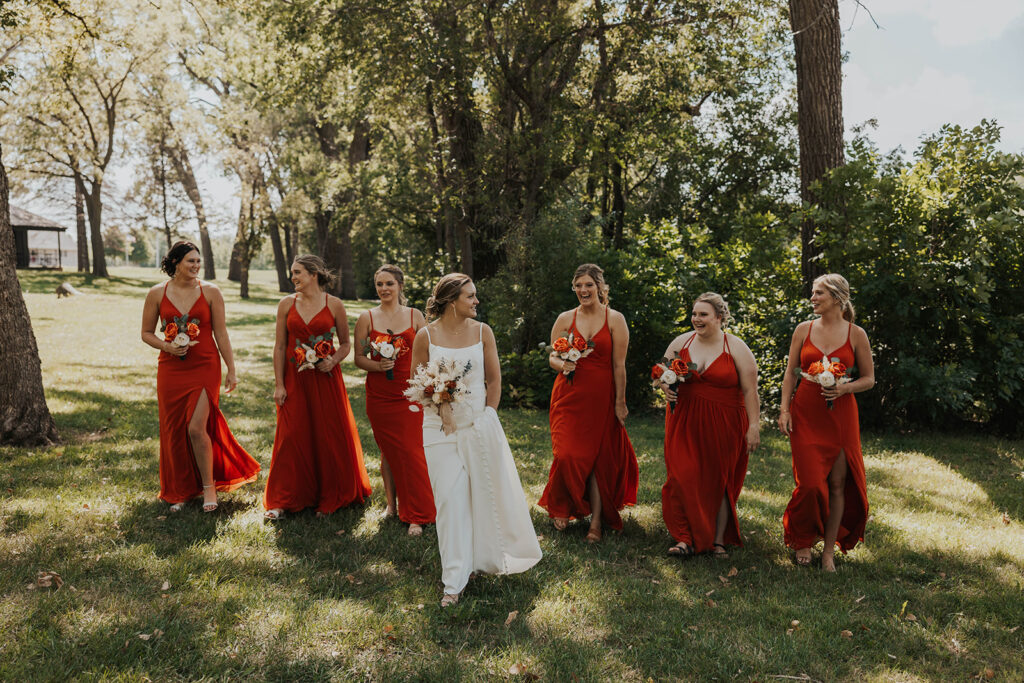 bride and bridesmaids, bridesmaids wearing red bridesmaid dresses