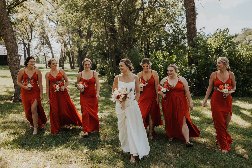 bride and bridesmaids, bridesmaids wearing red bridesmaid dresses