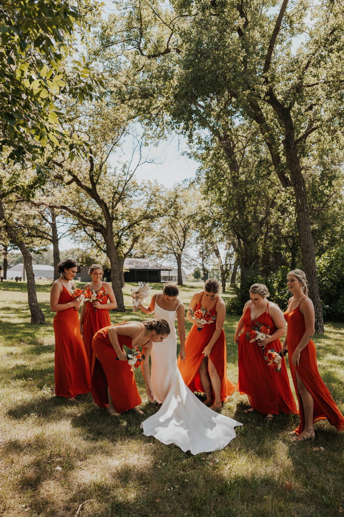 bride and bridesmaids, bridesmaids wearing red bridesmaid dresses