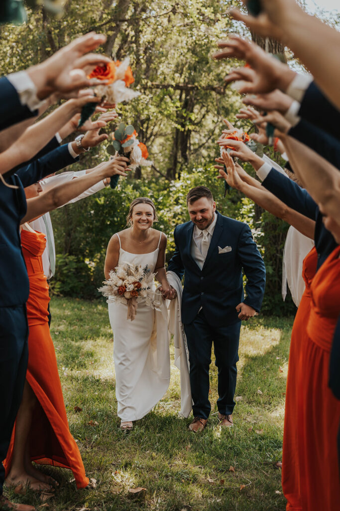 bride and groom and their wedding party