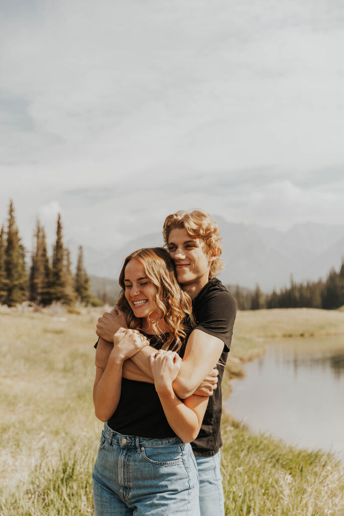 caleb hugging lauren from behind 