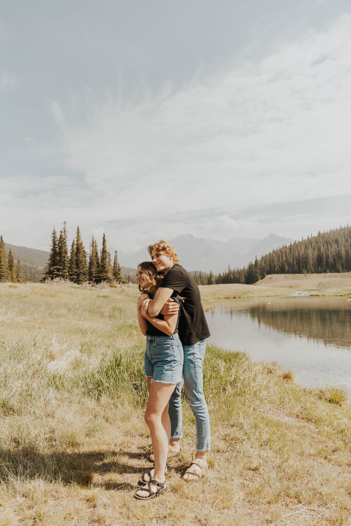 caleb hugging lauren from behind 