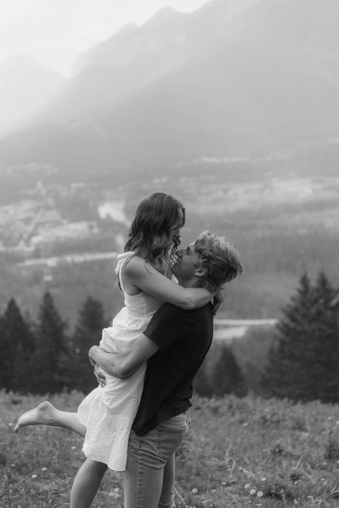 caleb and lauren wearing neutral engagement outfits for their banff engagement photos