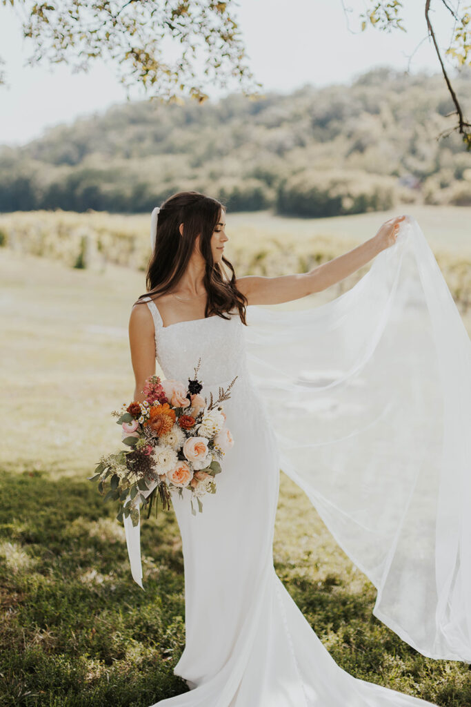 bridal portrait in a gorgeous green vineyard