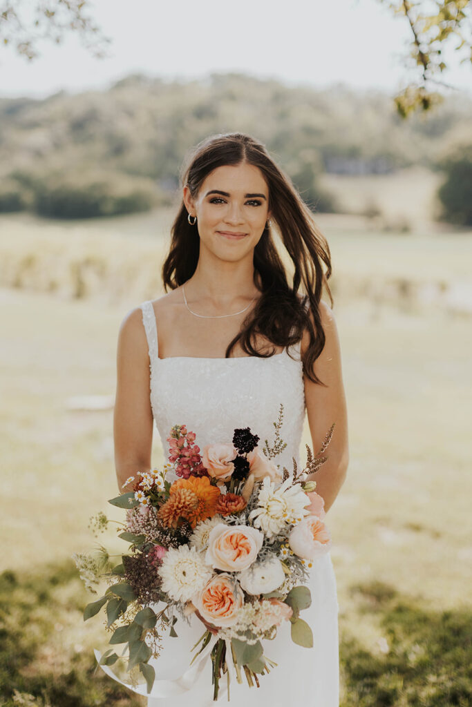 bridal portrait in a gorgeous green vineyard