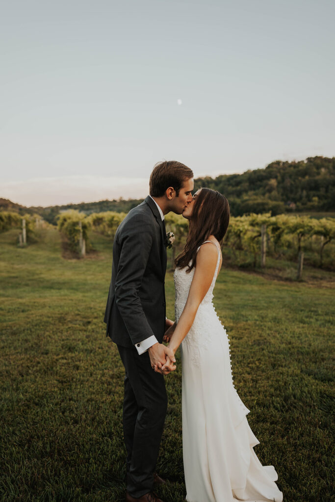 bride and groom in a vineyard in Willow Brooke Farm