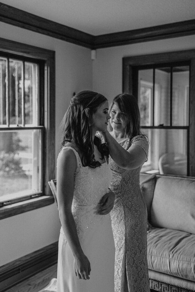 bride getting ready in a cozy, neutral color room