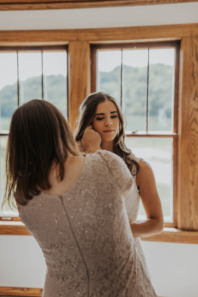 bride getting ready in a cozy, neutral color room