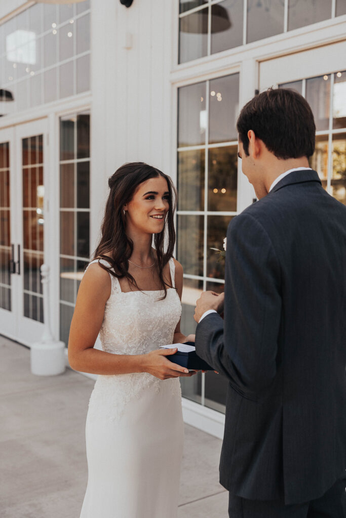 bride and groom exchanging private vows during first look