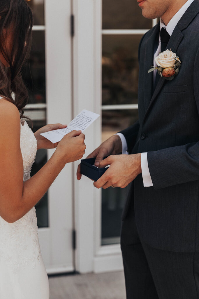 bride and groom exchanging private vows during first look