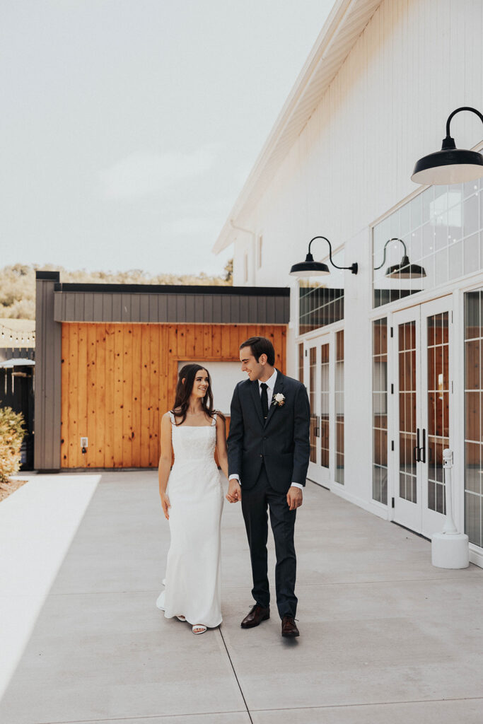 romantic bride and groom walking around