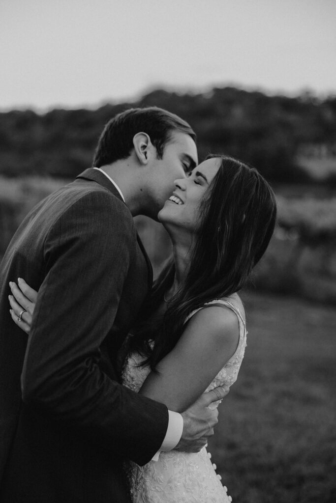 bride and groom in a vineyard in Willow Brooke Farm