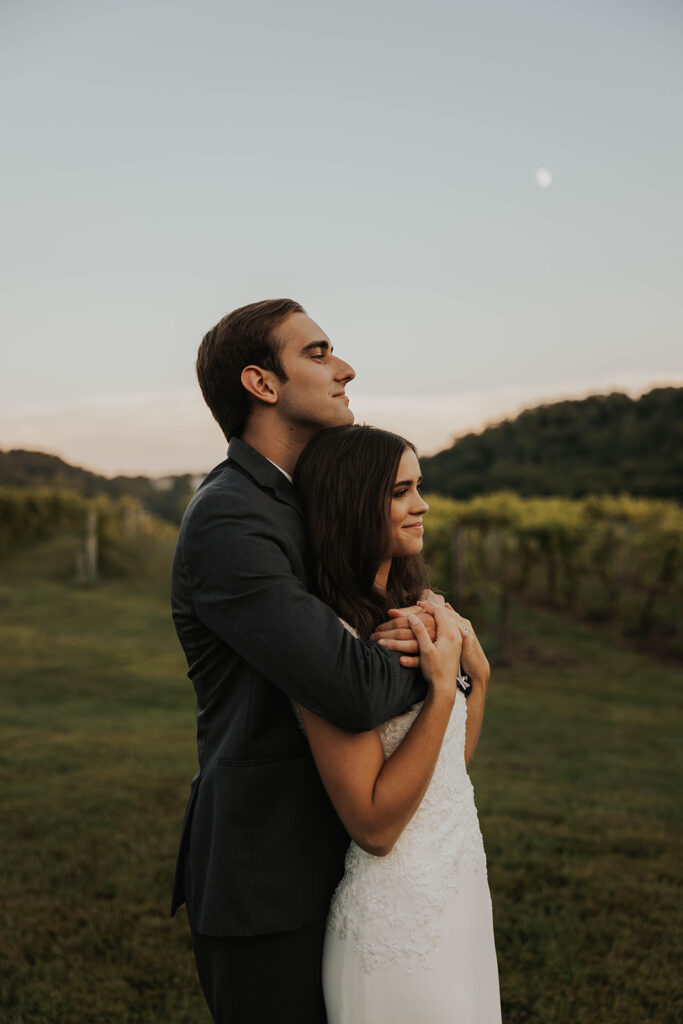 bride and groom in a vineyard in Willow Brooke Farm