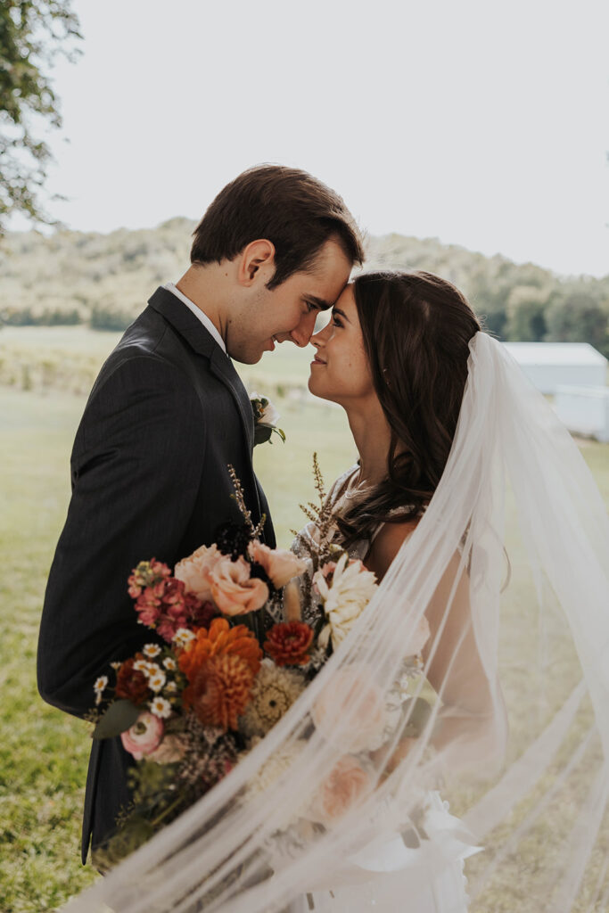 bride and groom wedding portrait during their garden wedding at willow brooke farm