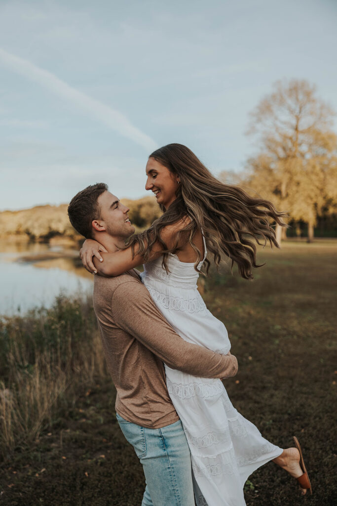 playful and candid Sienna and Wyatt kissing and fooling around for their engagement session