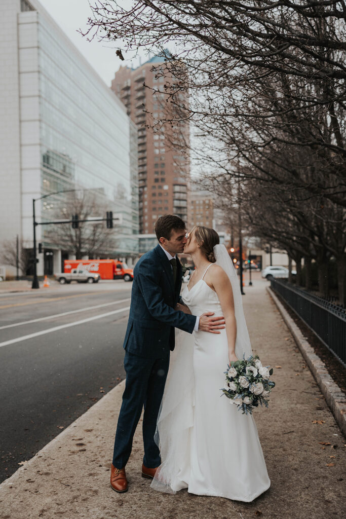 bride and groom outdoor wedding portrait in the city