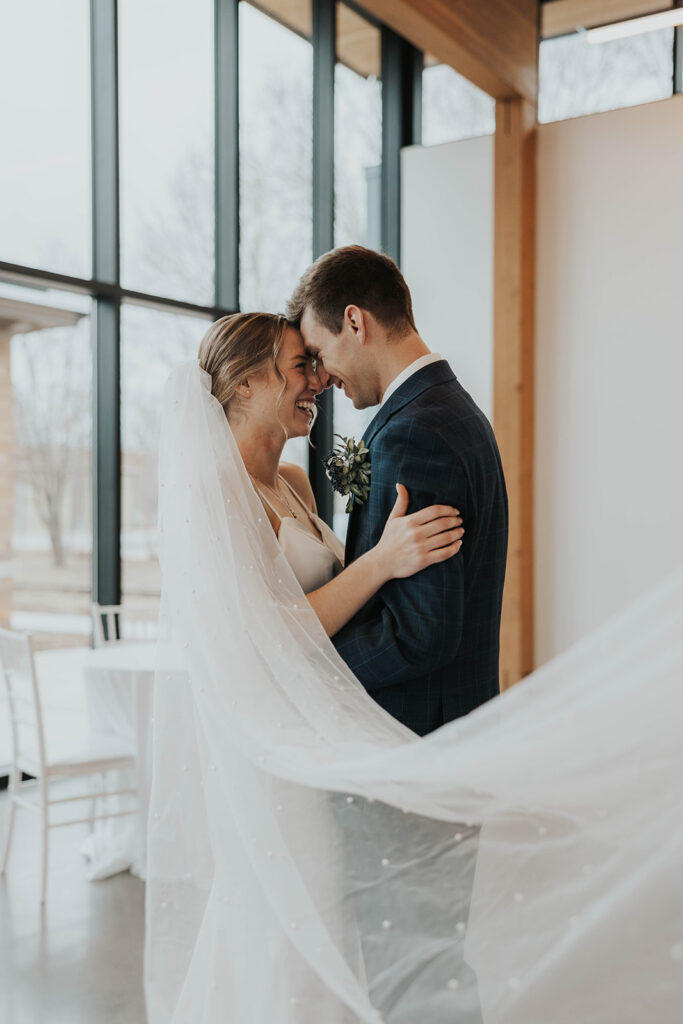 intimate bride and groom wedding portrait indoors in Des Moines Heritage Center