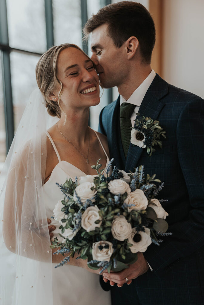 intimate bride and groom wedding portrait indoors in Des Moines Heritage Center