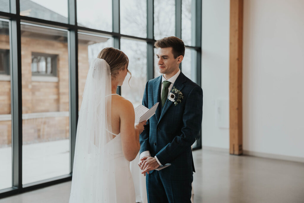 bride and groom exchanging private vows