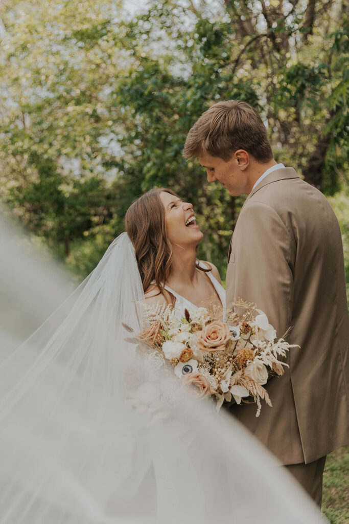 playful and candid bride and groom portraits