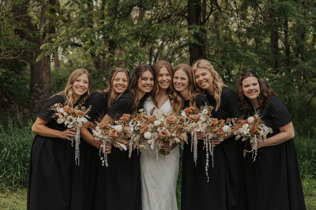 bride and bridesmaids, bridesmaids wearing black matching bridesmaid dresses