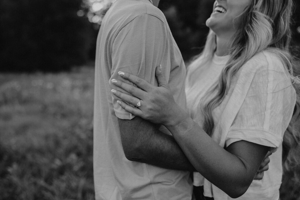 playful and romantic field engagement photos in Sibley State Park, MN