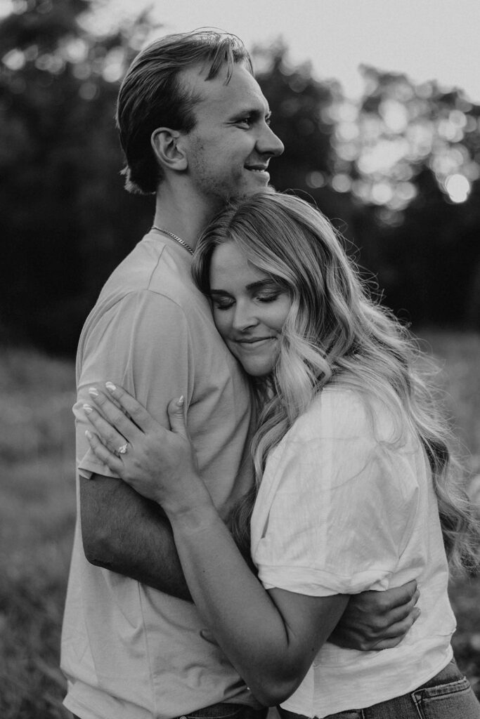 playful and romantic field engagement photos in Sibley State Park, MN