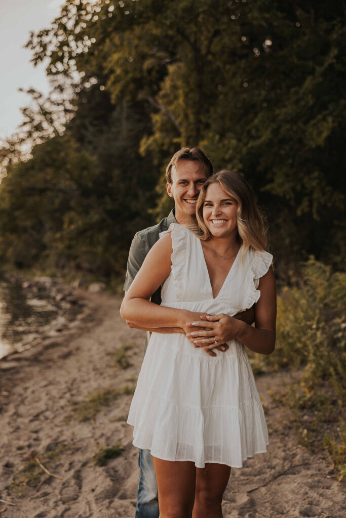 playful and romantic waterfront engagement photos in sibley state park, mn