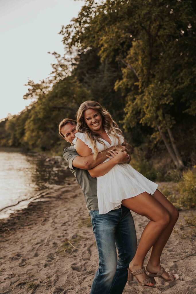 playful and romantic waterfront engagement photos in sibley state park, mn