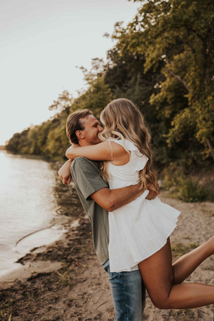 playful and romantic waterfront engagement photos in sibley state park, mn