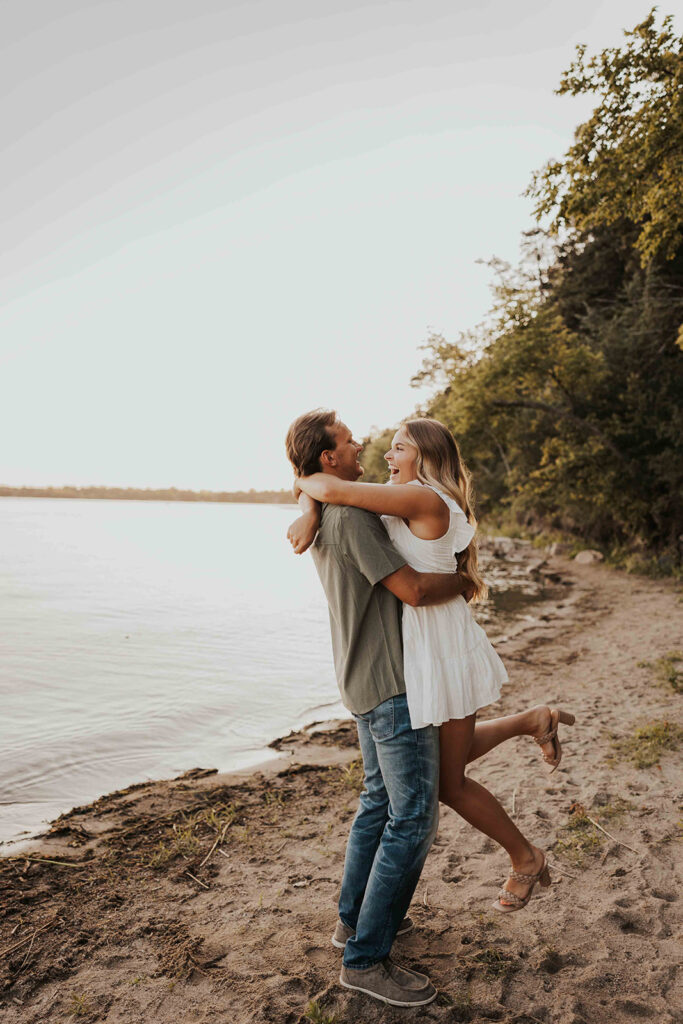 playful and romantic waterfront engagement photos in sibley state park, mn