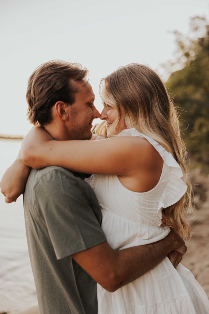 playful and romantic waterfront engagement photos in sibley state park, mn