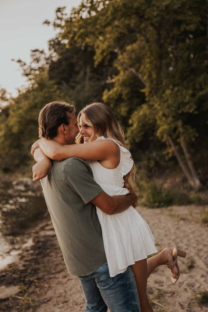 playful and romantic waterfront engagement photos in sibley state park, mn