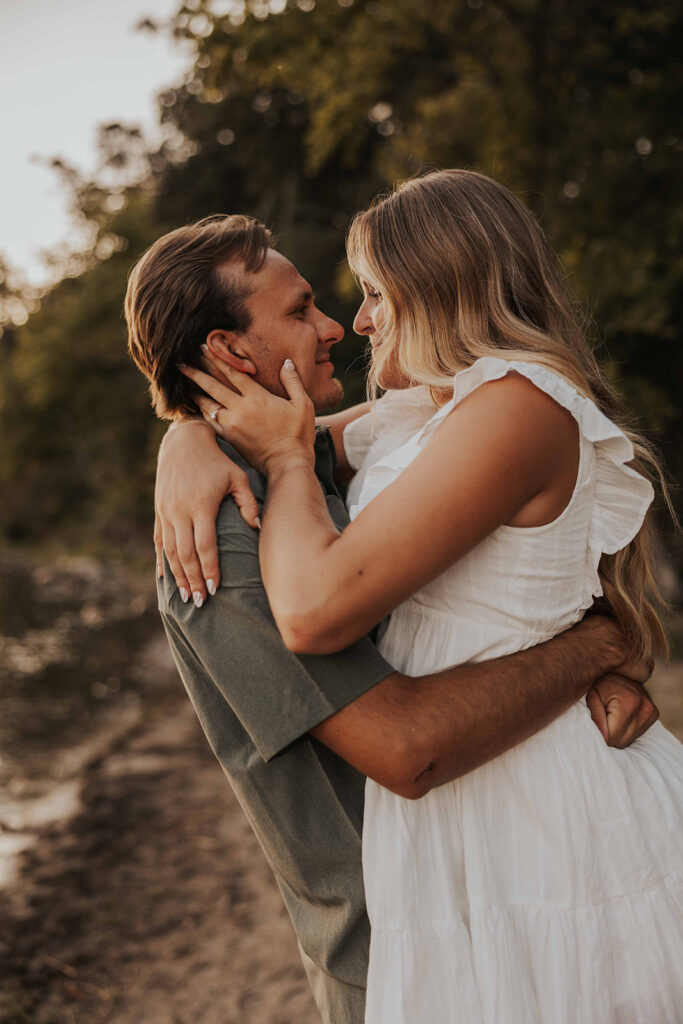 playful and romantic waterfront engagement photos in sibley state park, mn